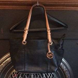 Michael Kors leather purse and wallet.